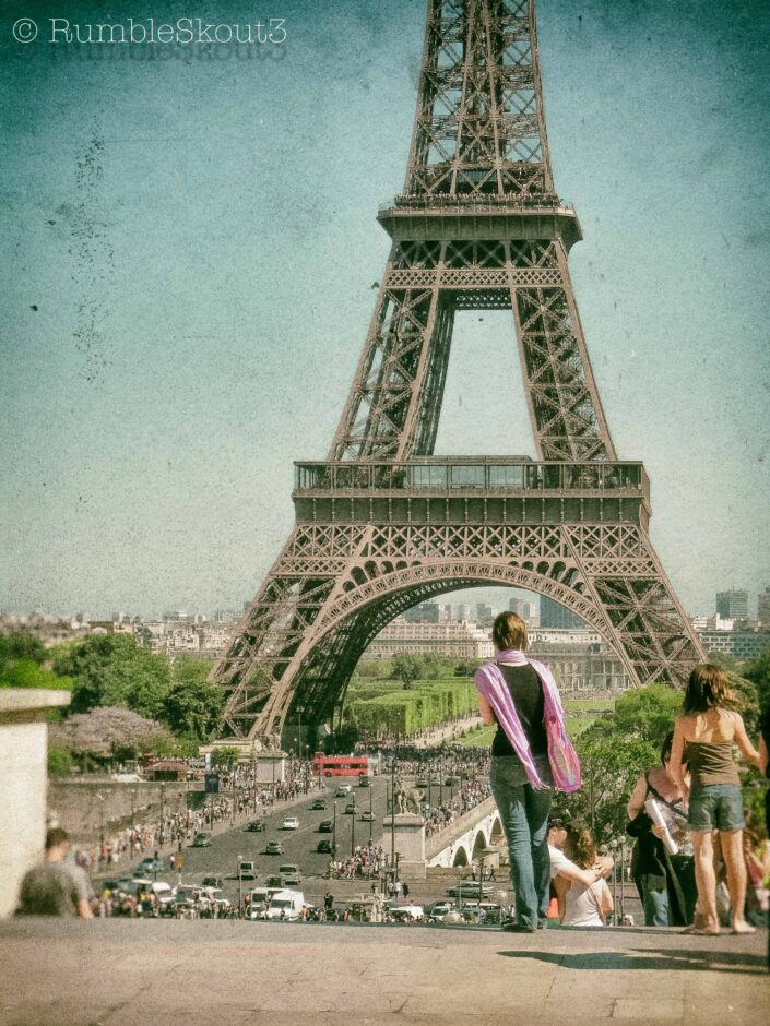 Catching her breath, at the first sight of her Eiffel Dream on the Champs de Mars from Jardins du Trocadéro as people near Eiffel Tower. around the 7th arrondissement