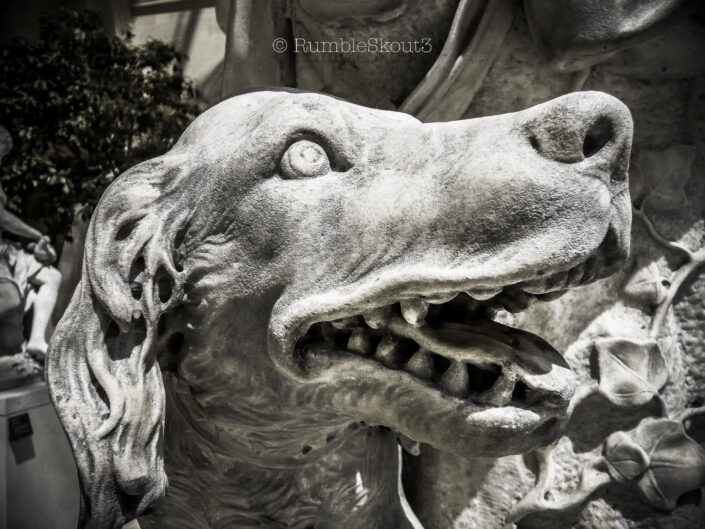 An endearing dog sculpture Chasseur au repos by Nicolas Coustou (1796) at The Richelieu Wing The Cour Marly inside the Louvre Museum, 1st arrondissement de Paris (black and white). Feliz Perro