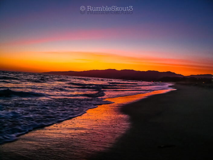 On a Santa Monica State Beach, an Alta California, Sunset (AfterGlow) with the Pacific Ocean washing onto the California Golden Coast.