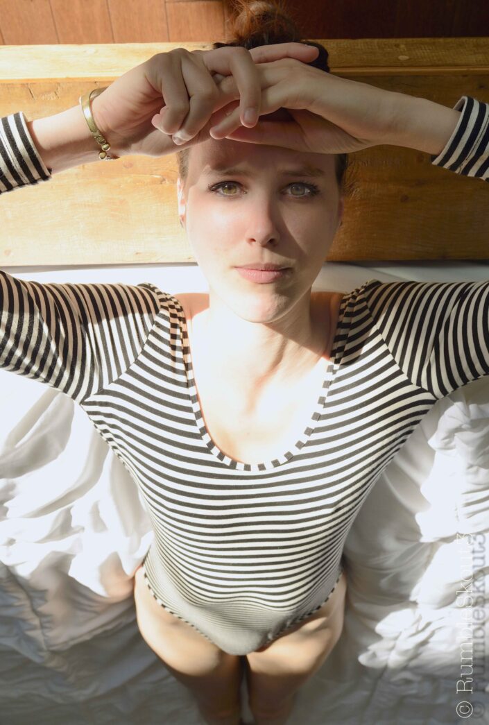 (french model bodysuit) (Natural Light Fashion Photography) (different-colored eyes) West Hollywood nikon photo session amber eye green eye Santos Platform Bed
