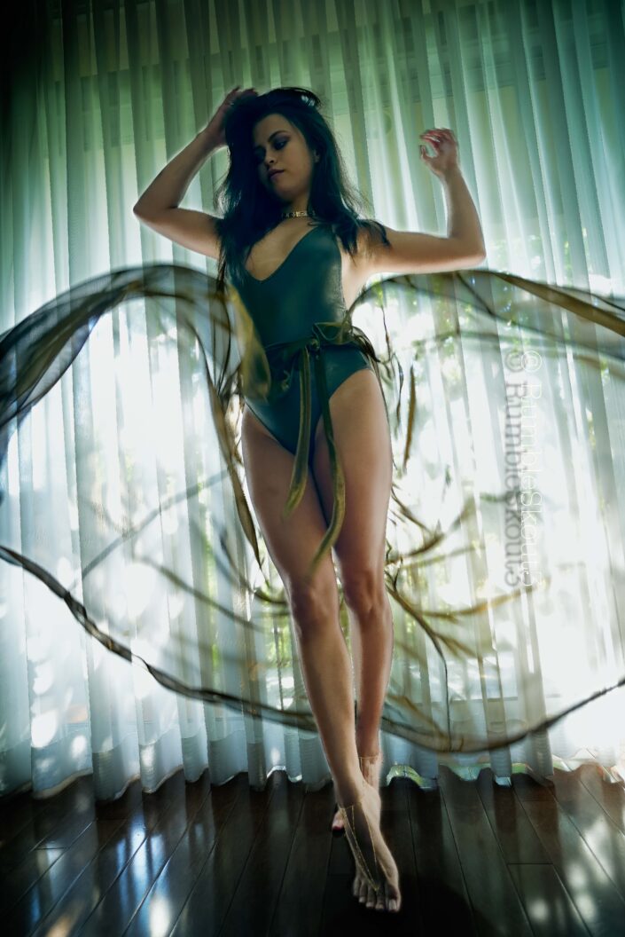 An uplifting wind under her wings in a natural light fashion photography session, with a bodysuit sheer dress, an American woman portrait is created in West Hollywood. A Cool Breeze (Uplifting) in a natural light fashion photography session with a bodysuit sheer dress, an American woman portrait is created. Butterfly Ascension II (Wonderland III)