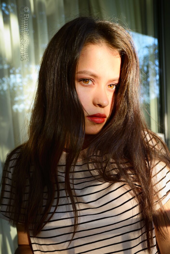 An Indigenous Mexican Nikon fine art Natural Light Fashion Photography session of Veronica Lake reincarnated in the flesh by a Hilfiger-Fashion-amber-eyed-American-beauty-fashion model. (American woman portrait) (amber eyes)