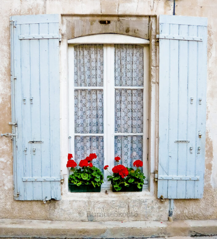 My sister Cindy's favorite window shutters with a red poppy flower pot, at Saint-Rémy-de-Provence, Provence-Alpes-Côte d'Azur, Le Midi.